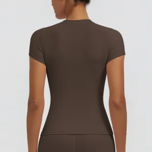 Back detail view of women slim fit brown short sleeve sports t shirt for quick dry yoga fitness.