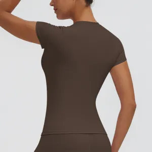 Detail view of women slim fit brown yoga top, short sleeve quick dry fitness sports shirt.