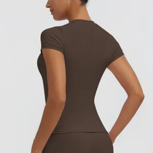 Women brown quick dry short sleeve yoga fitness top detail view activewear shirt.