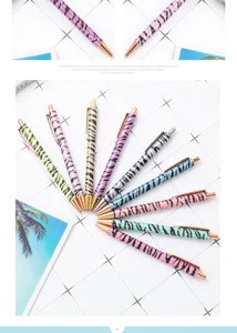 Glitter zebra print ballpoint pen set, colorful metallic retractable pens with shiny details.