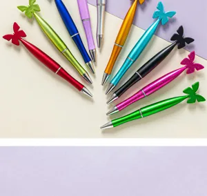 Colorful butterfly glitter plastic ballpoint pens for cute student gifts and school supplies.