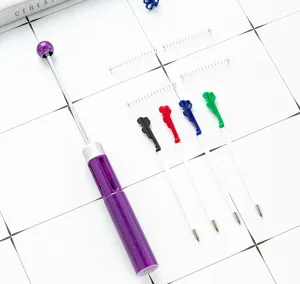 Set de bolígrafo con cuentas DIY de 4 colores con recambios coloridos, resortes y cuerpo morado