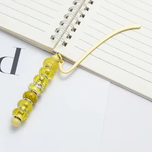 DIY beaded metal bookmark with yellow beads cute creative stationery gift for students.