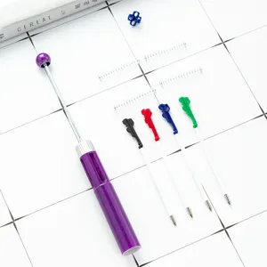 Kit de bolígrafo de cuentas de 4 colores DIY con cuerpo morado brillante y 4 recambios.