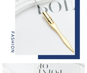 Detailed view of the portable gold metal letter opener and multi-function craft knife tool.
