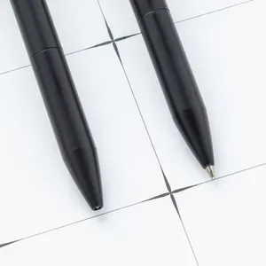 Sleek black metal ballpoint pens with minimalist twist design for smooth daily writing office use.