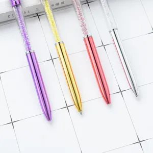 Set of 4 colorful crystal ballpoint pens with metallic barrels and shimmering rhinestones.