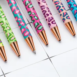 Colorful leopard print ballpoint pens with rose gold metal tips, cute student stationery.