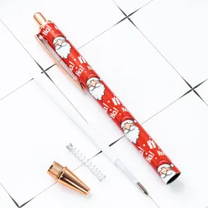 Christmas themed retractable ballpoint pen with cute Santa pattern and metal clip components.