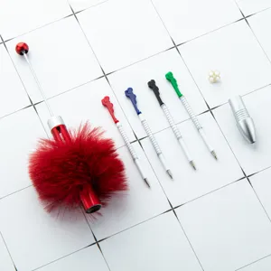DIY four color pom pom beaded ballpoint pen set with fluffy plush design for students and journaling.