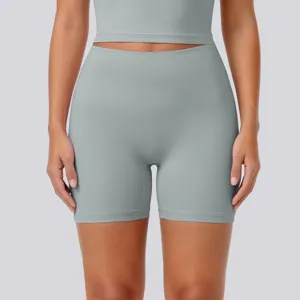 Detail shot of high-waist yoga shorts and crop top, breathable athletic wear for fitness.