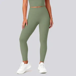 Detailed view of high waist seamless yoga leggings in olive green, flexible activewear fabric.