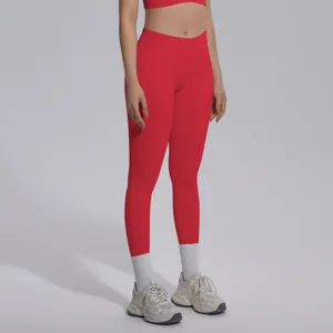 Red seamless high-waist yoga leggings detail showcasing stretchy breathable gym activewear fit.