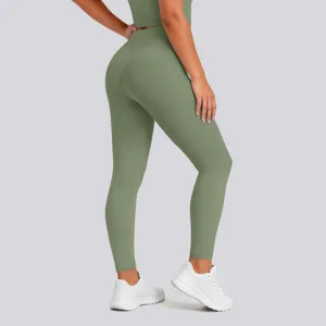 Close-up detail of high waist yoga leggings showing shaping fit and comfortable elastic fabric.