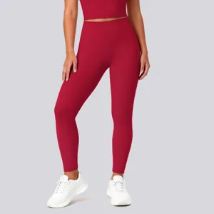 Detailed view of high waist red yoga leggings and active crop top sportswear fitness.