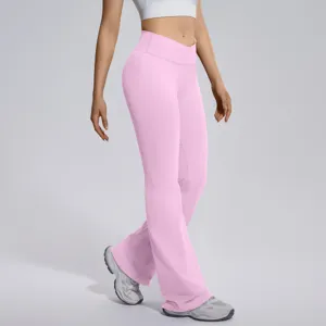 Pink cross-waist flare yoga pants detail shot, high stretch fabric for fitness and running.