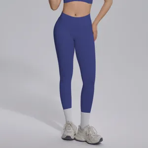 Detailed view of seamless high-waisted V-waist yoga pants, breathable fabric, ideal fitness wear.