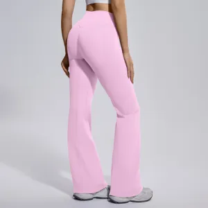 High-waist pink flared yoga pants back detail, seamless tummy control fitness activewear leggings.