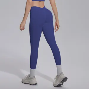 Seamless blue V-waist yoga pants offering breathable and butt-lifting athletic performance.
