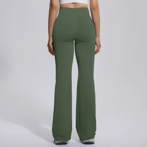 Back view detail of women's seamless high waist flare yoga pants in dark green, stretchy fabric.
