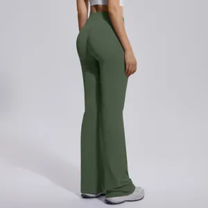Close-up detail of high-waist flared yoga pants back view, stretchy athletic leggings.