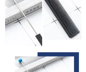 Detail view of professional hair comb with metal tail pin and fine teeth for salon styling.