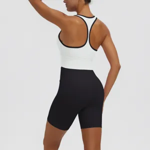 Back view of women's breathable double-sided sports bra and yoga shorts activewear set.