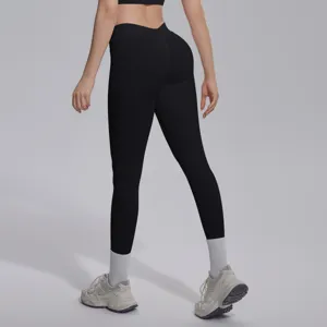 Seamless V-waist knit yoga leggings for women, breathable hip-lifting workout pants.