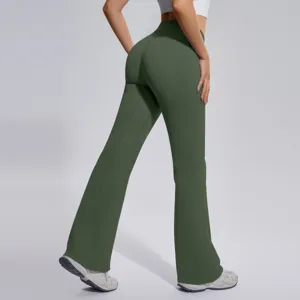 Detailed view of dark green high-waisted flared yoga pants, showing shape and stretch fabric.
