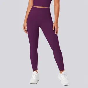 High-waisted solid purple yoga leggings for women, stretchy fitness and running activewear pants.
