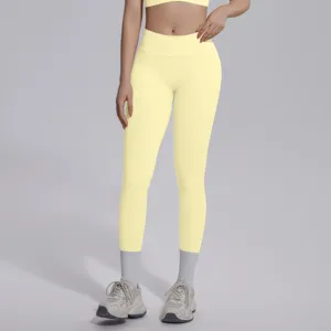 Seamless knit V-waist light yellow yoga leggings detail view, breathable and high stretch.