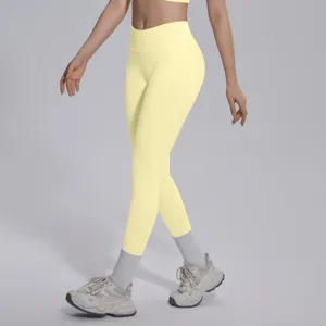 Seamless knit solid color V-waist tight breathable butt lifting yoga pants for fitness.