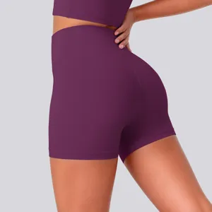 Close-up view of high waist purple yoga shorts, breathable athletic tight fit activewear.