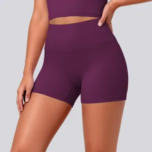 Close-up view of women high waist purple yoga shorts showcasing elastic fabric and fit details.