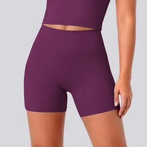 High waist purple yoga shorts and crop top set, breathable stretchy fitness sportswear detail.