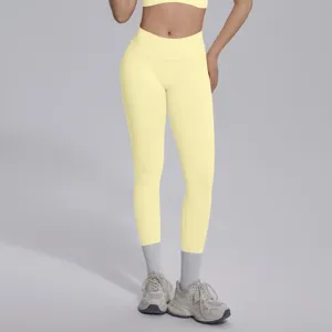 Seamless knit yoga leggings detail view, high V-waist design, breathable fabric for workouts.