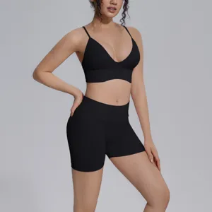 Conjunto de yoga sin costuras liso sujetador deportivo y pantalones cortos fitness mujer gym.