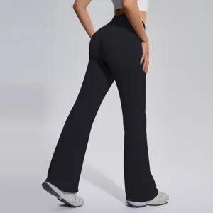 Seamless flared yoga pants with high waist and tummy control for running and fitness workouts.