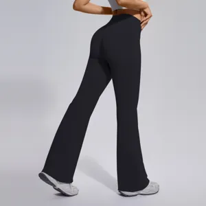 Black high-waisted seamless flare yoga pants detail showing back view and premium stretch fabric.