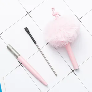 Pink flamingo plush pom-pom ballpoint pen with refill, cute stationery for school writing.