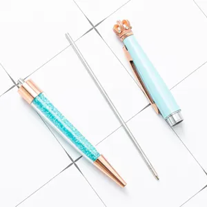 Luxury crown ballpoint pen with sparkling crystals and refill for office and school stationery.