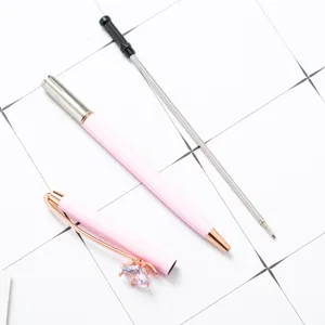 Pink metal ballpoint pen with crystal diamond clip, elegant office gift writing supply main.