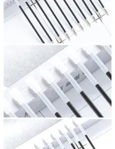 Detail view of smooth plastic black ink ballpoint pen refill for office writing use.