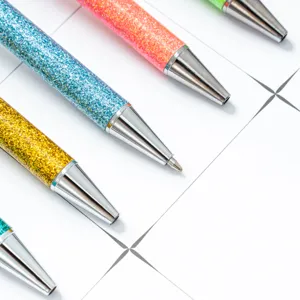 Colorful glitter ballpoint pens set, trendy office stationery with sparkling gradient design.