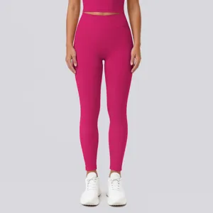 High-waisted pink yoga pants for women, seamless fitness activewear leggings for running workout.