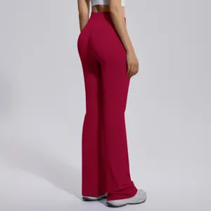 Detailed back view of high-waisted red flare yoga pants, showcasing stretch fit and bootcut.