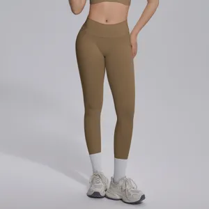 Detailed view of seamless high-waist V-waist yoga leggings, breathable fitness activewear pants.