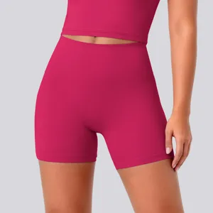 High-waist yoga shorts detail shot showing breathable elastic fabric and slim fit design.