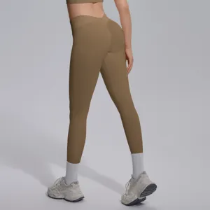 Back view detail of seamless knit V-waist fitness yoga pants showing butt-lifting design.
