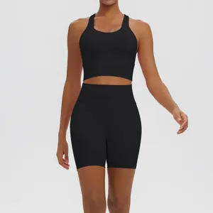Detail view of the solid black backless yoga set, breathable activewear sports two-piece suit.